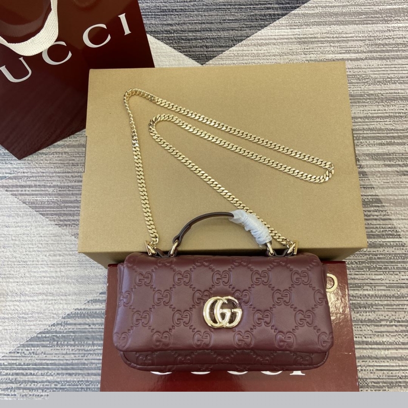 G*u*i top handle bags